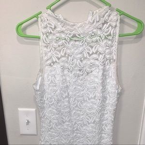 White, lace, high neck dress. Soprano brand